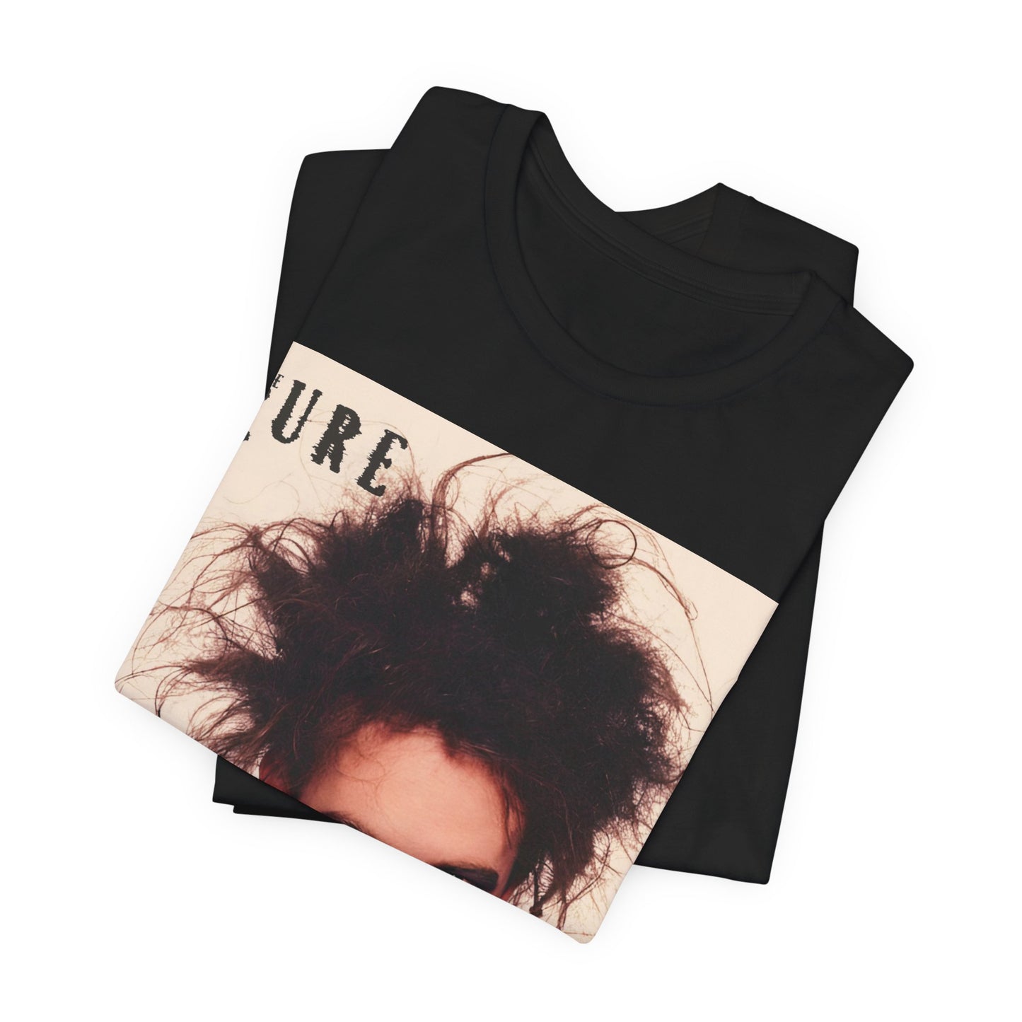 A black graphic t-shirt featuring a photo portrait of Robert Smith from The Cure.