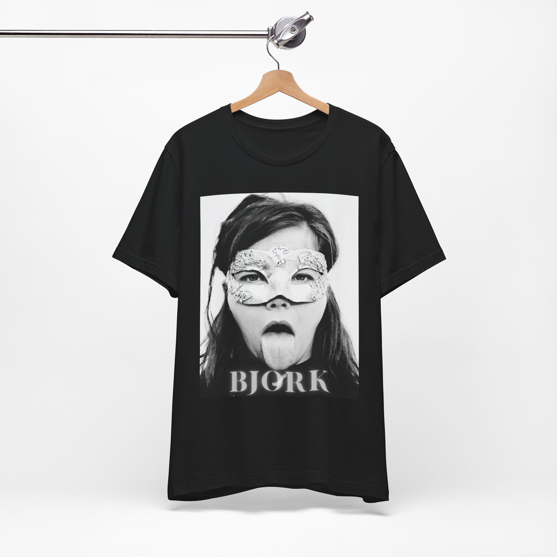 A black graphic t-shirt featuring a black and white portrait photo of Bjork.