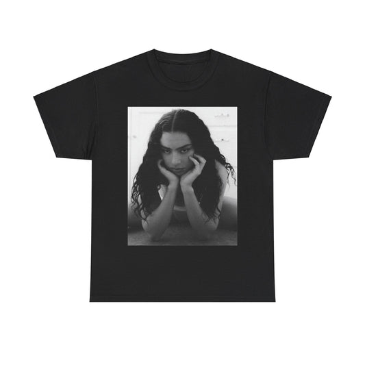 A black graphic t-shirt featuring a black and white, monochrome graphic or photo of Charli XCX.