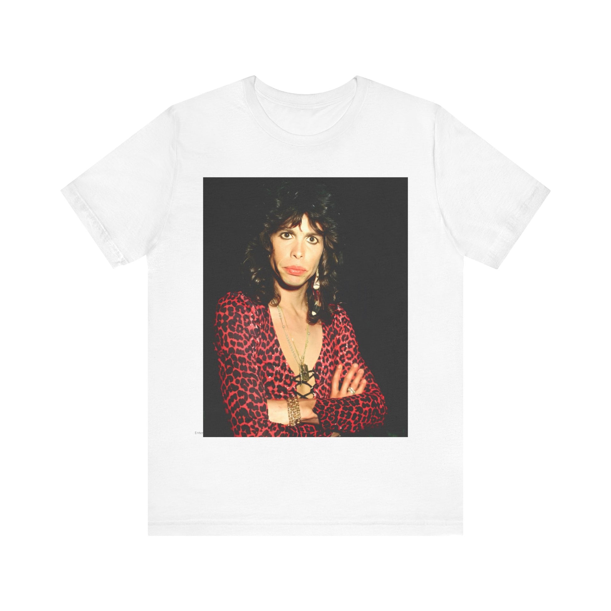 A black graphic t-shirt featuring a vintage 70s-inspired design with Aerosmith branding, incorporating a prominent leopard print pattern.