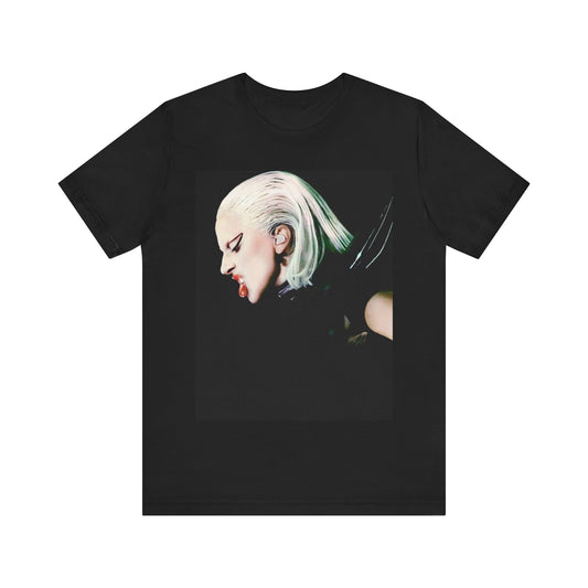 A black graphic t-shirt featuring a retro graphic related to Lady Gaga's 'The Fame Monster' album era.