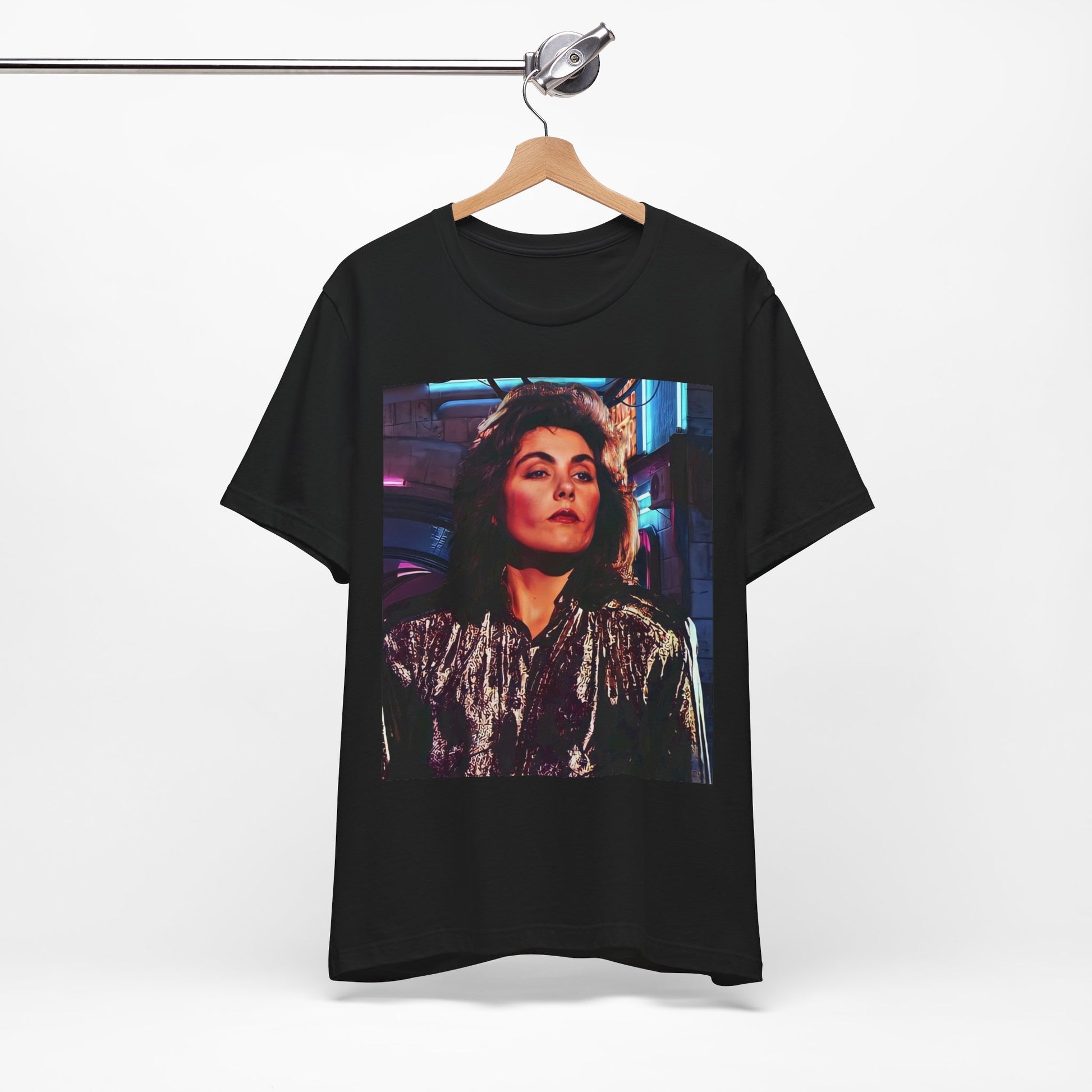 A black graphic t-shirt featuring an 80s synth pop aesthetic graphic of Laura Branigan.