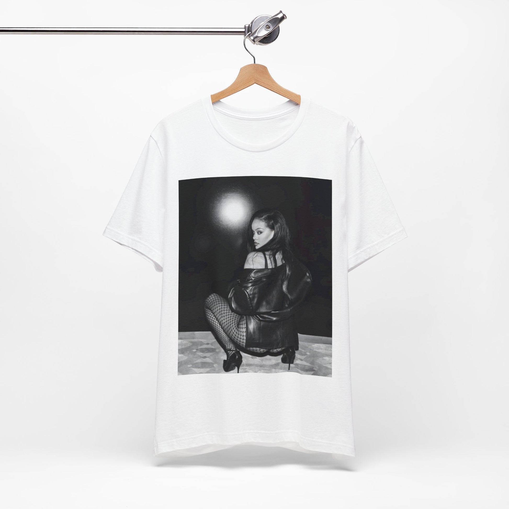 A black graphic t-shirt featuring a black and white sexy graphic of Rihanna.