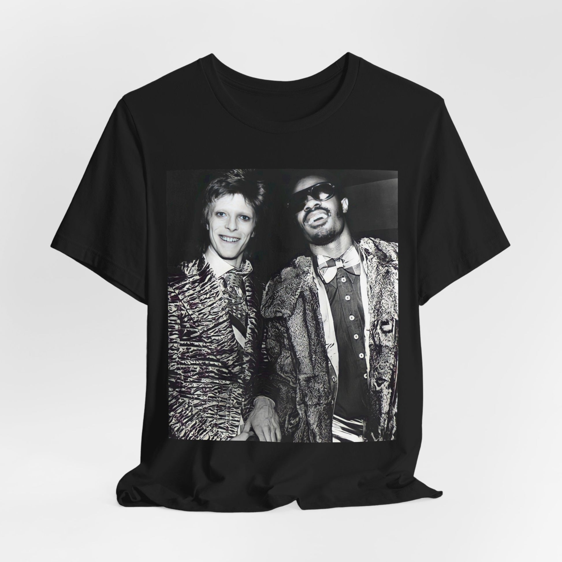 A black graphic t-shirt featuring a retro graphic of Stevie Wonder and David Bowie together.