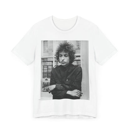 A black graphic t-shirt featuring a black and white graphic of Bob Dylan from the folk revival era.