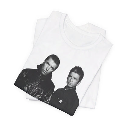 A black graphic t-shirt featuring a graphic of Oasis, possibly suggesting a reunion.