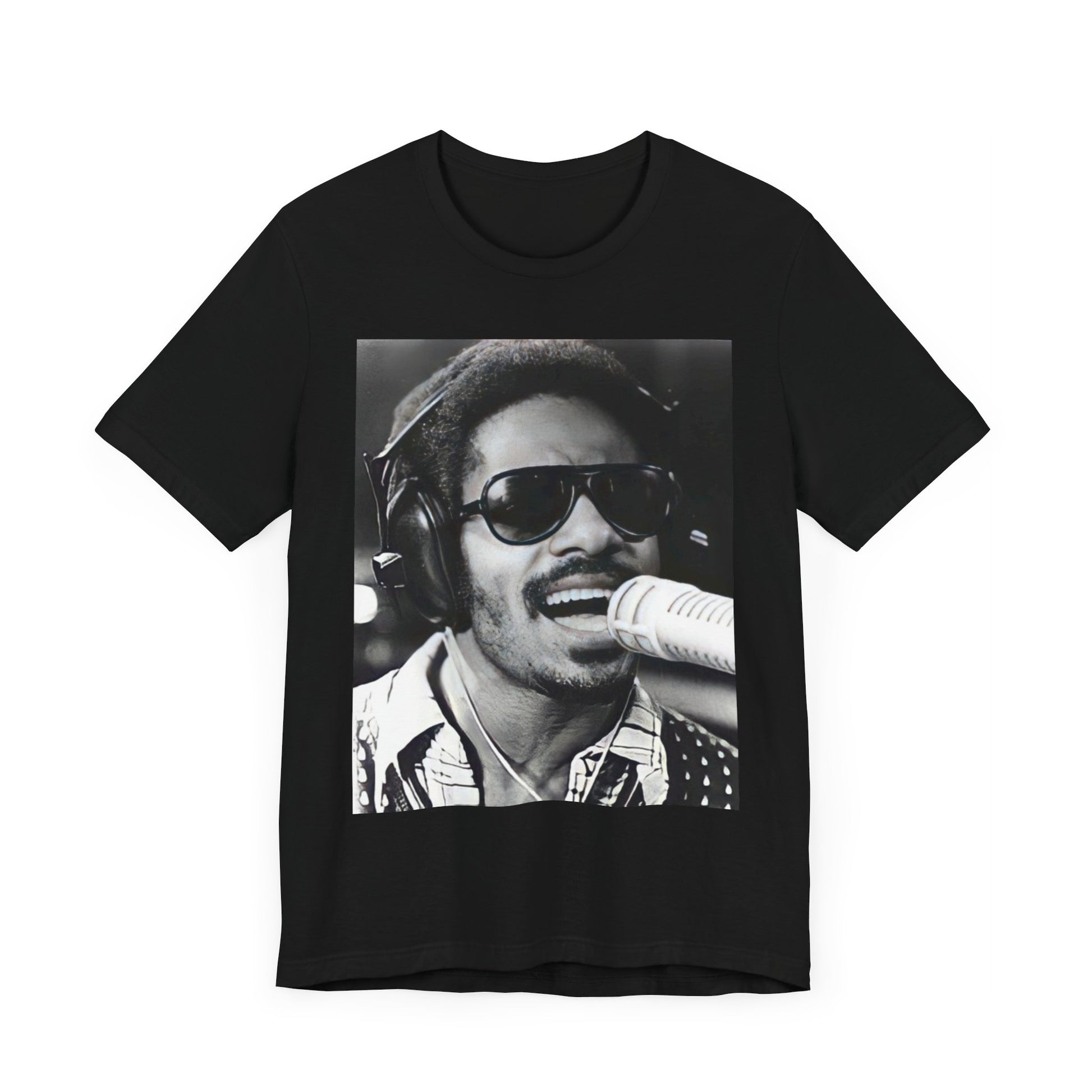 A black graphic t-shirt featuring a graphic of Stevie Wonder as a timeless visionary.