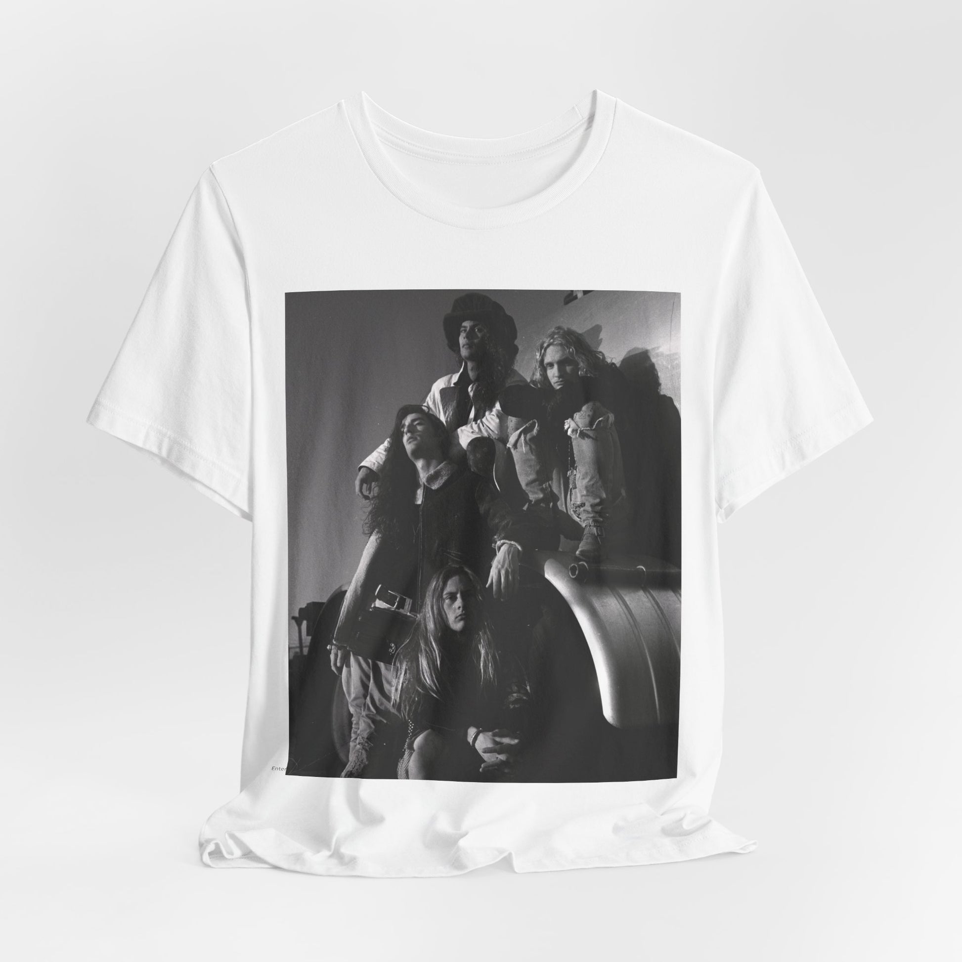 A black graphic t-shirt featuring a 90s black and white photographic portrait of the band Alice In Chains, capturing their iconic grunge look.