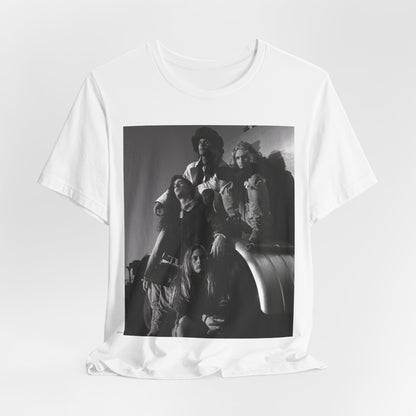 A black graphic t-shirt featuring a 90s black and white photographic portrait of the band Alice In Chains, capturing their iconic grunge look.