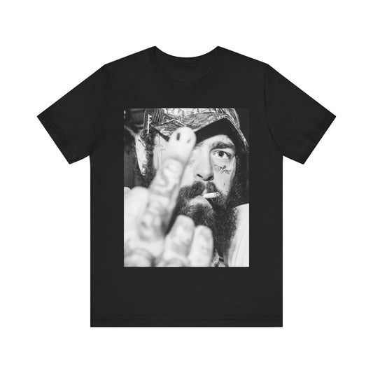 A black graphic t-shirt featuring a black and white graphic of Post Malone giving the middle finger.