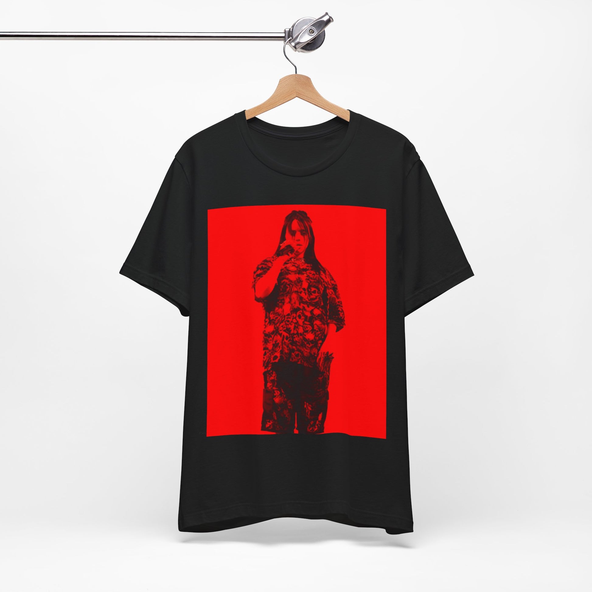 A portrait of Billie Eilish with platinum blonde hair from her 'Happier Than Ever' era, looking over her shoulder, printed on a graphic t-shirt.