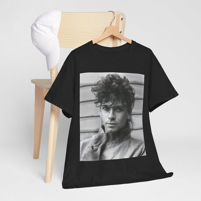 A black graphic t-shirt featuring a retro black and white graphic or photo of Michael Hutchence from INXS.
