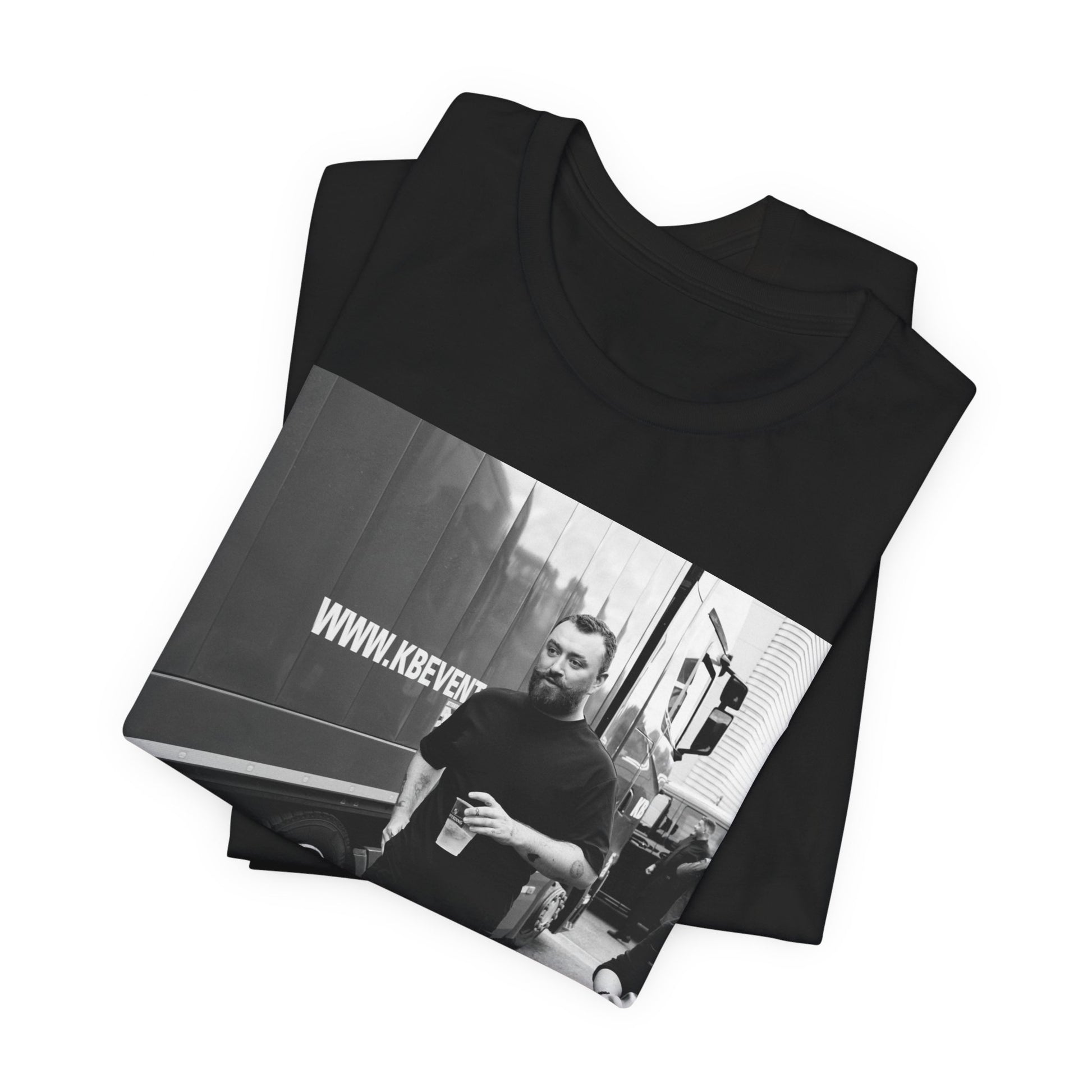 A black graphic t-shirt featuring a graphic or photo of Sam Smith in a backstage setting.