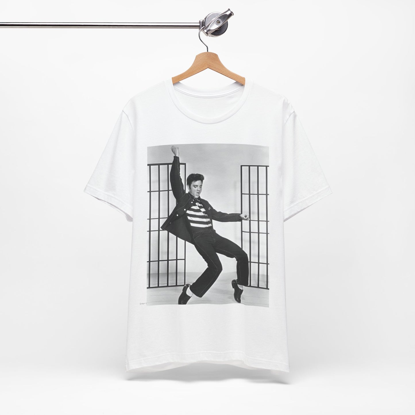 A black graphic t-shirt featuring a graphic related to Elvis Presley's 'Jailhouse Rock' song.