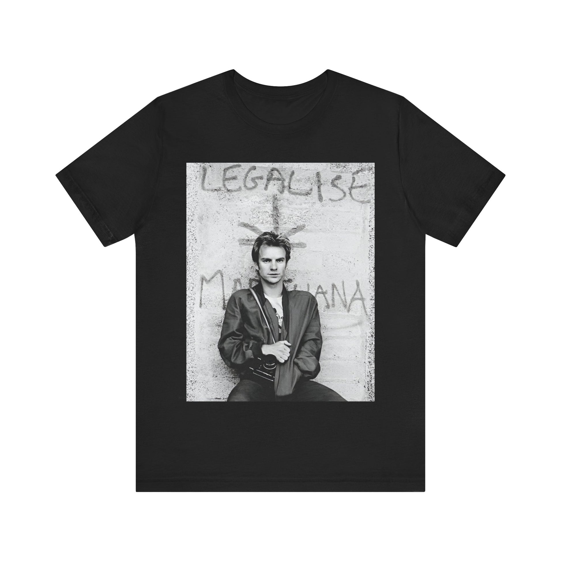 A black graphic t-shirt featuring a graphic of The Police with reggae-influenced pop elements.