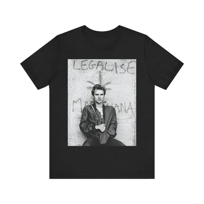 A black graphic t-shirt featuring a graphic of The Police with reggae-influenced pop elements.