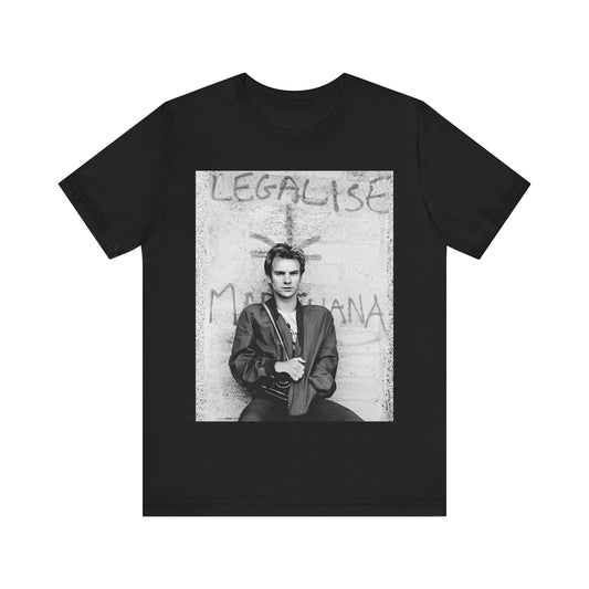 A black graphic t-shirt featuring a graphic of The Police with reggae-influenced pop elements.