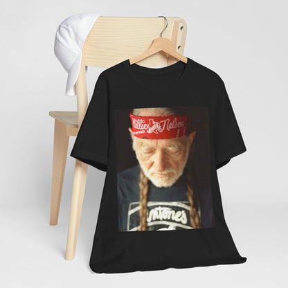 A black graphic t-shirt featuring a Texas music aesthetic graphic of Willie Nelson.