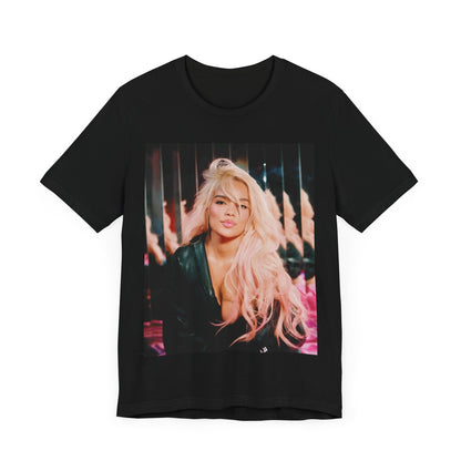 A black graphic t-shirt featuring a graphic of Karol G as an empowered Latina icon.