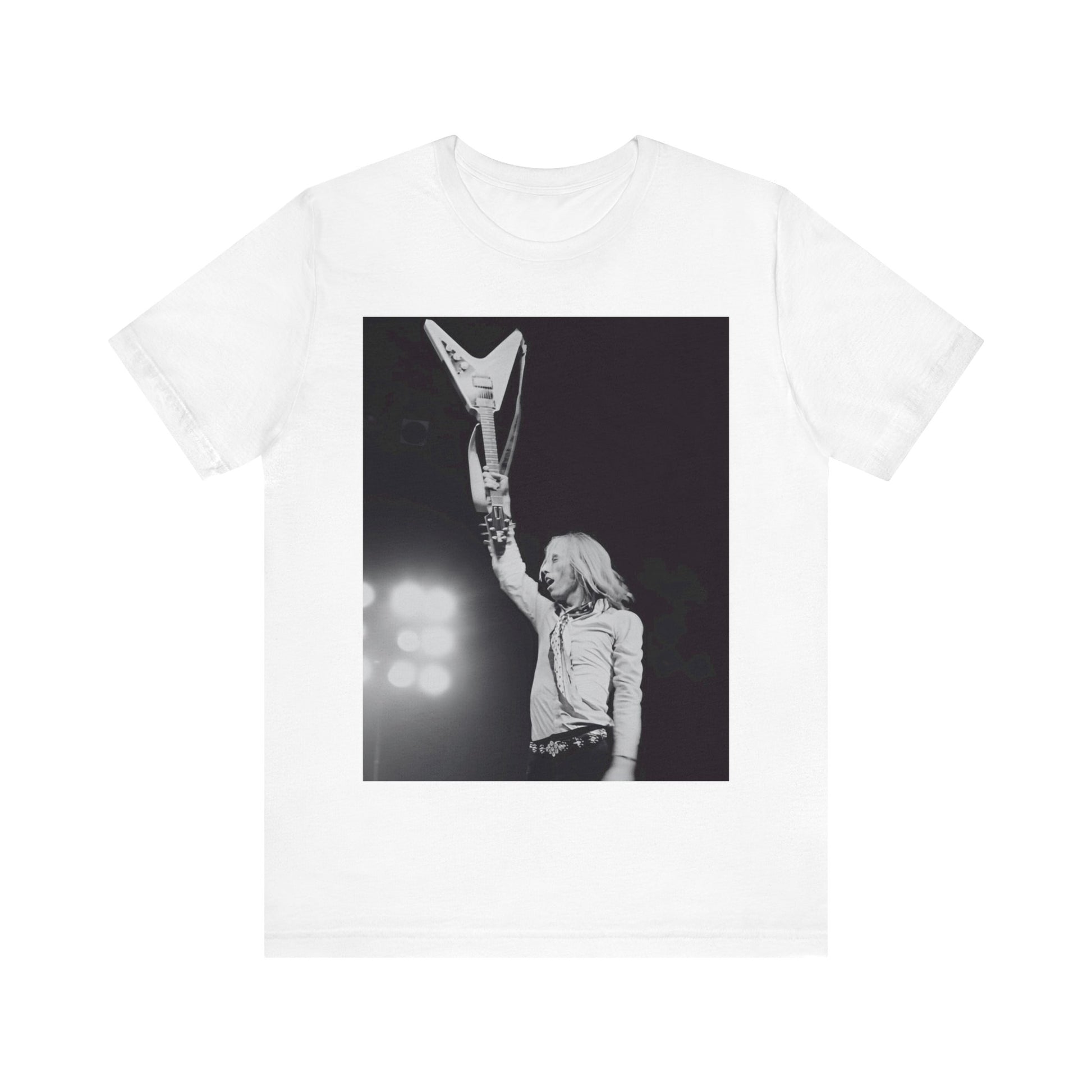 A black graphic t-shirt featuring a graphic or photo of Tom Petty playing guitar on stage.