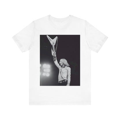 A black graphic t-shirt featuring a graphic or photo of Tom Petty playing guitar on stage.