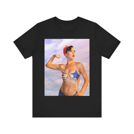 A black graphic t-shirt featuring a bold graphic of Katy Perry as a pop superstar.