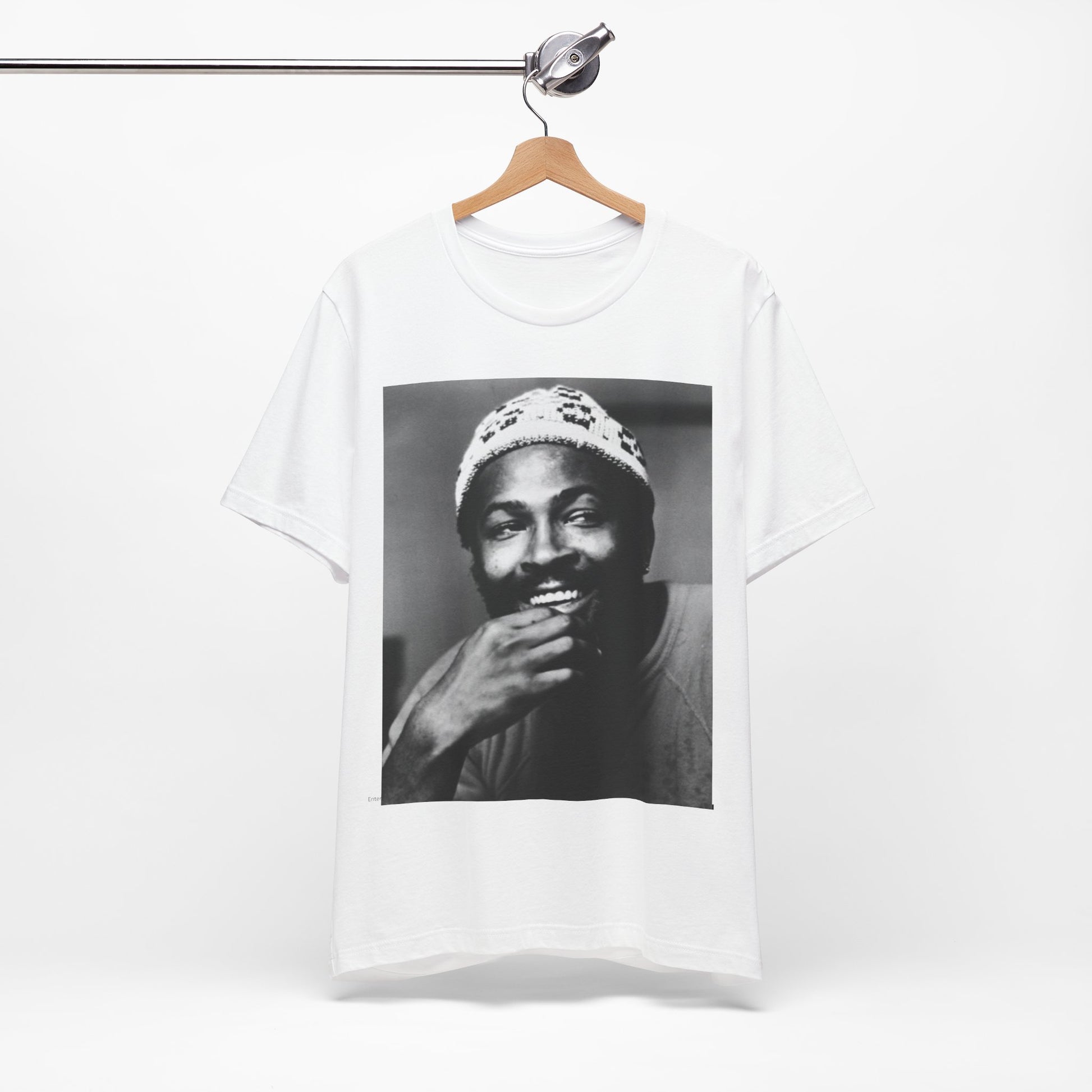 A black graphic t-shirt featuring a 70s retro portrait graphic of Marvin Gaye.
