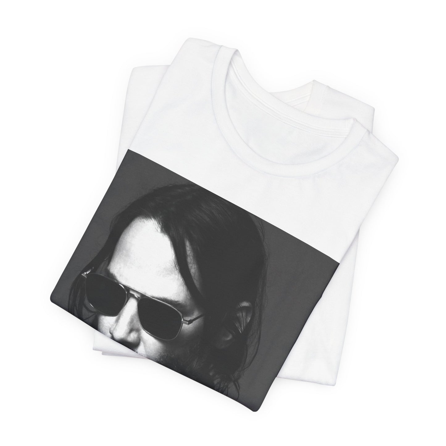 A black graphic t-shirt featuring a graphic of Keanu Reeves with a rebel spirit aesthetic.