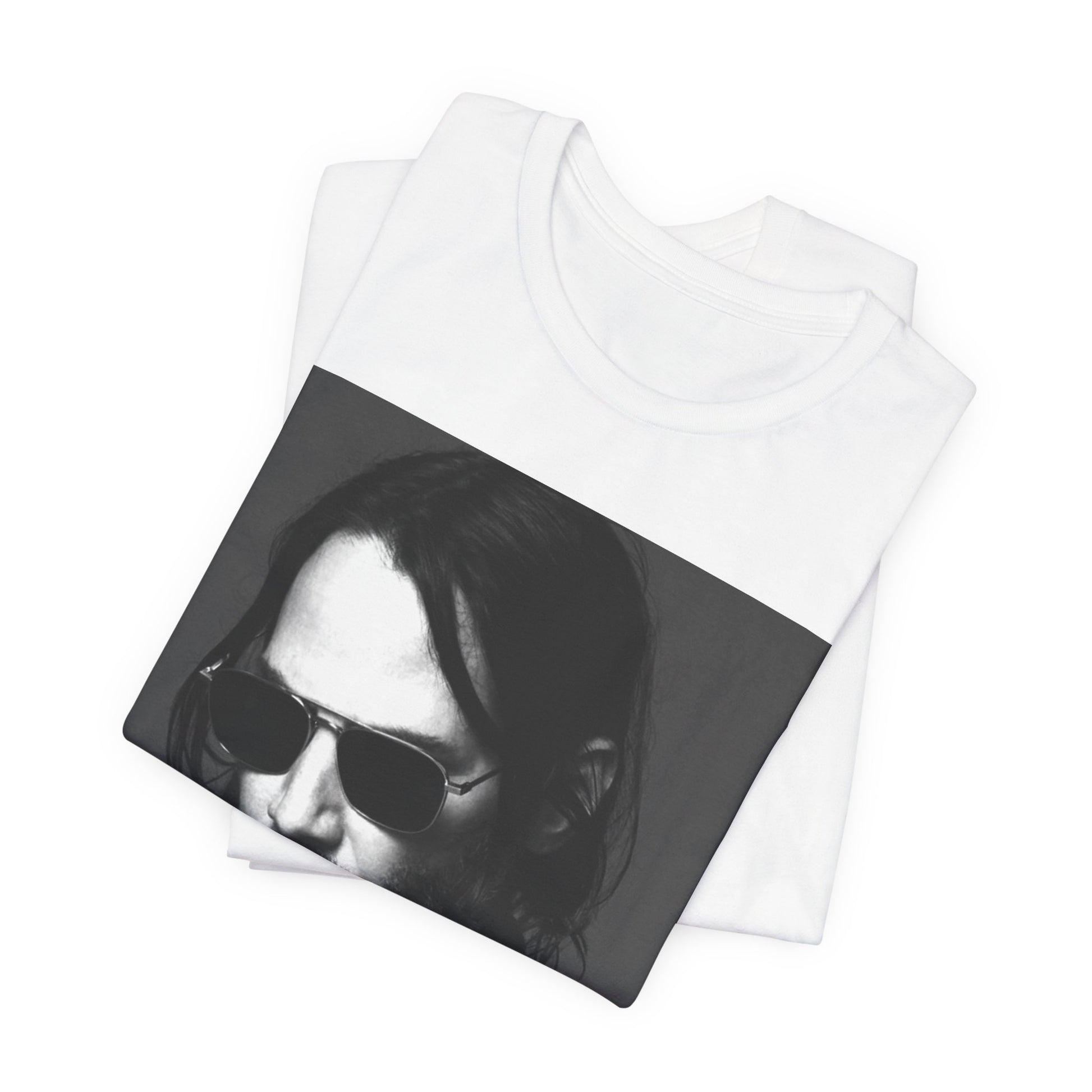 A black graphic t-shirt featuring a graphic of Keanu Reeves with a rebel spirit aesthetic.