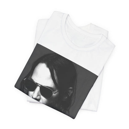 A black graphic t-shirt featuring a graphic of Keanu Reeves with a rebel spirit aesthetic.