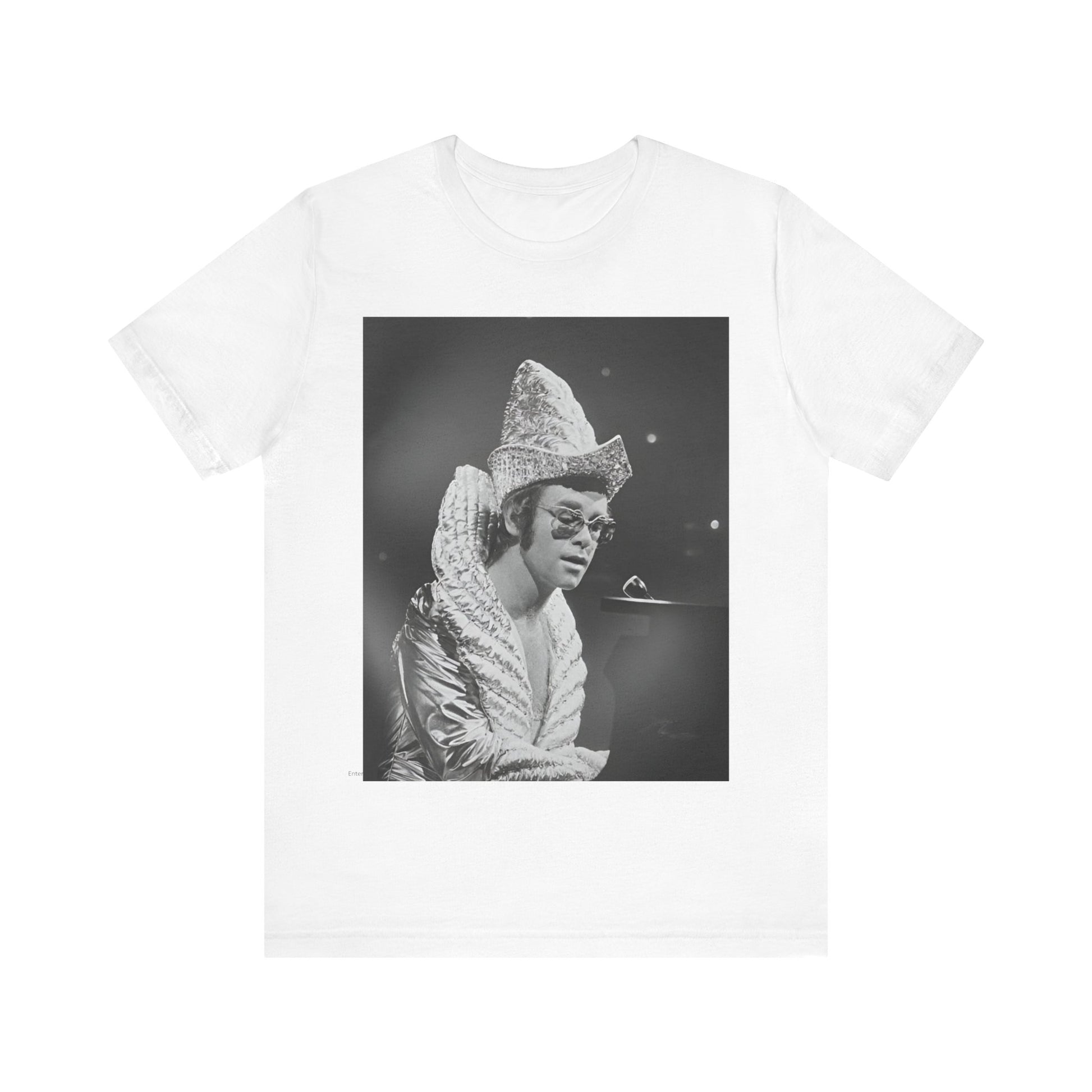 A black graphic t-shirt featuring a 70s pop aesthetic graphic of Elton John.