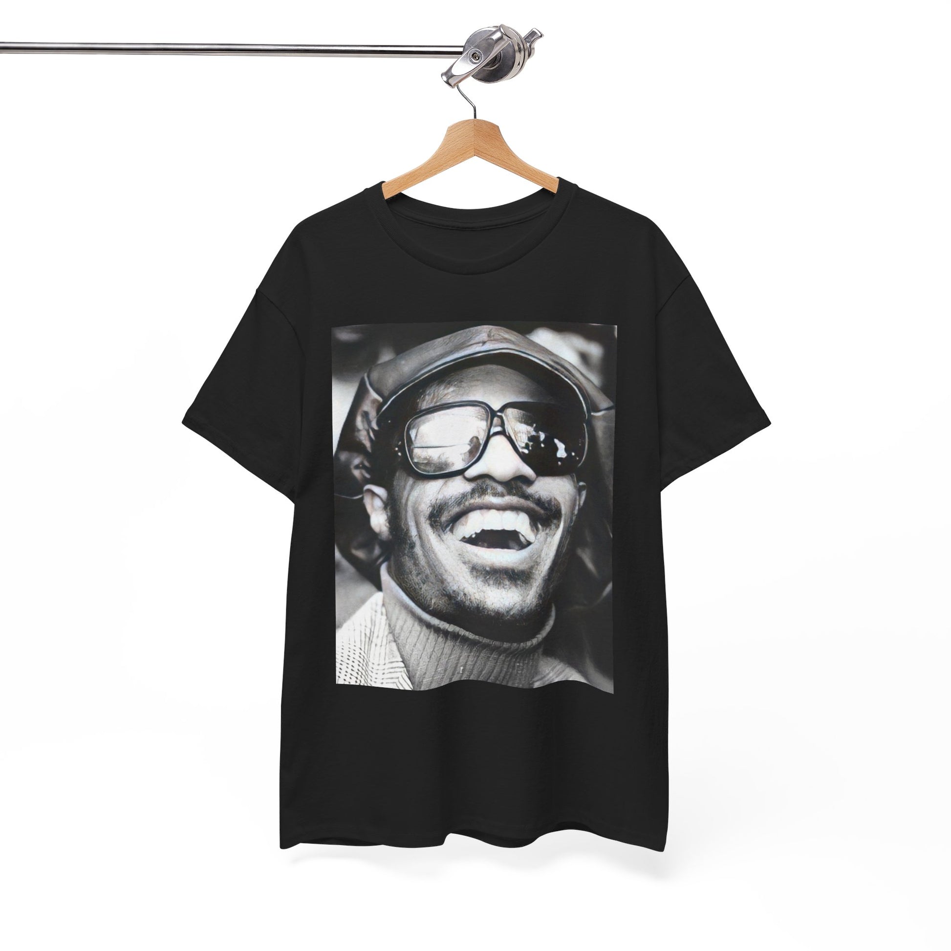 A black graphic t-shirt featuring a black and white portrait photo of Stevie Wonder.