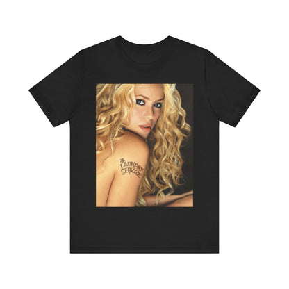 A black graphic t-shirt featuring a glamorous portrait graphic of Shakira.