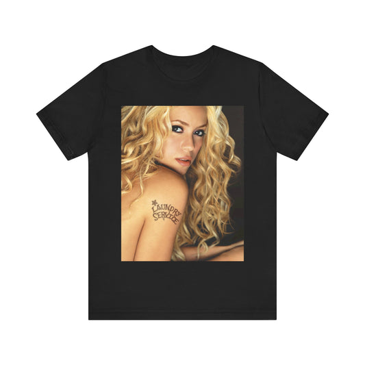 A black graphic t-shirt featuring a glamorous portrait graphic of Shakira.