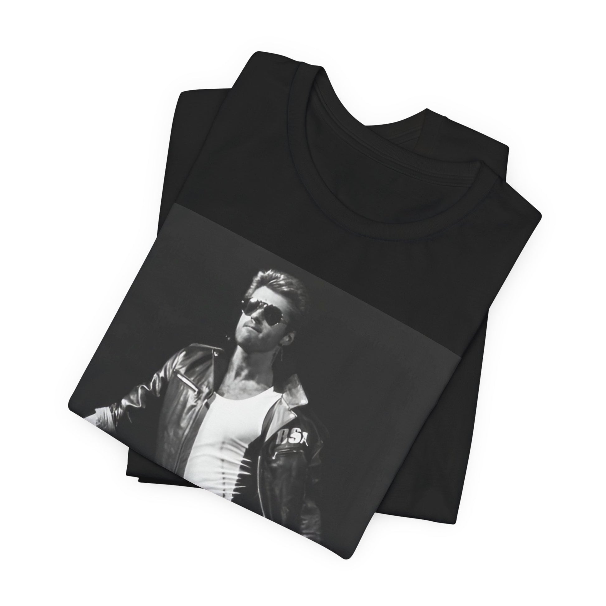 A black graphic t-shirt featuring a retro black and white monochrome graphic or photo of George Michael.