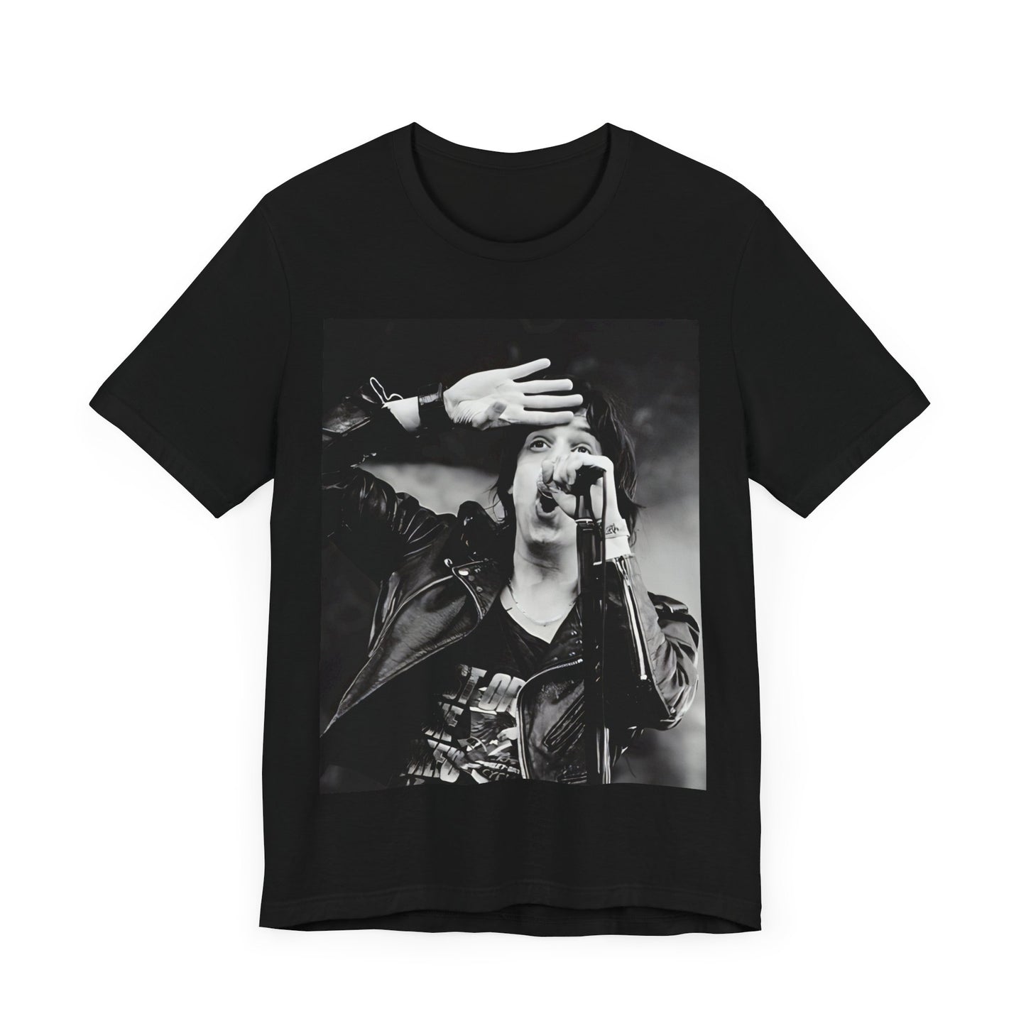 A black graphic t-shirt featuring a black and white portrait photo of The Strokes band.