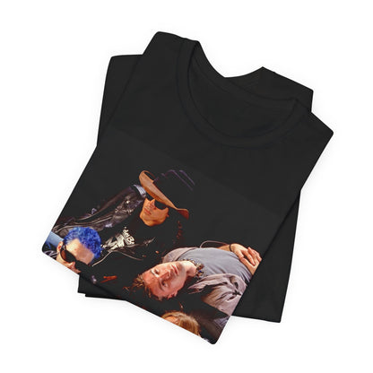 A black graphic t-shirt featuring a 90s grunge rock band graphic for Alice In Chains, possibly with band members or stylized elements.
