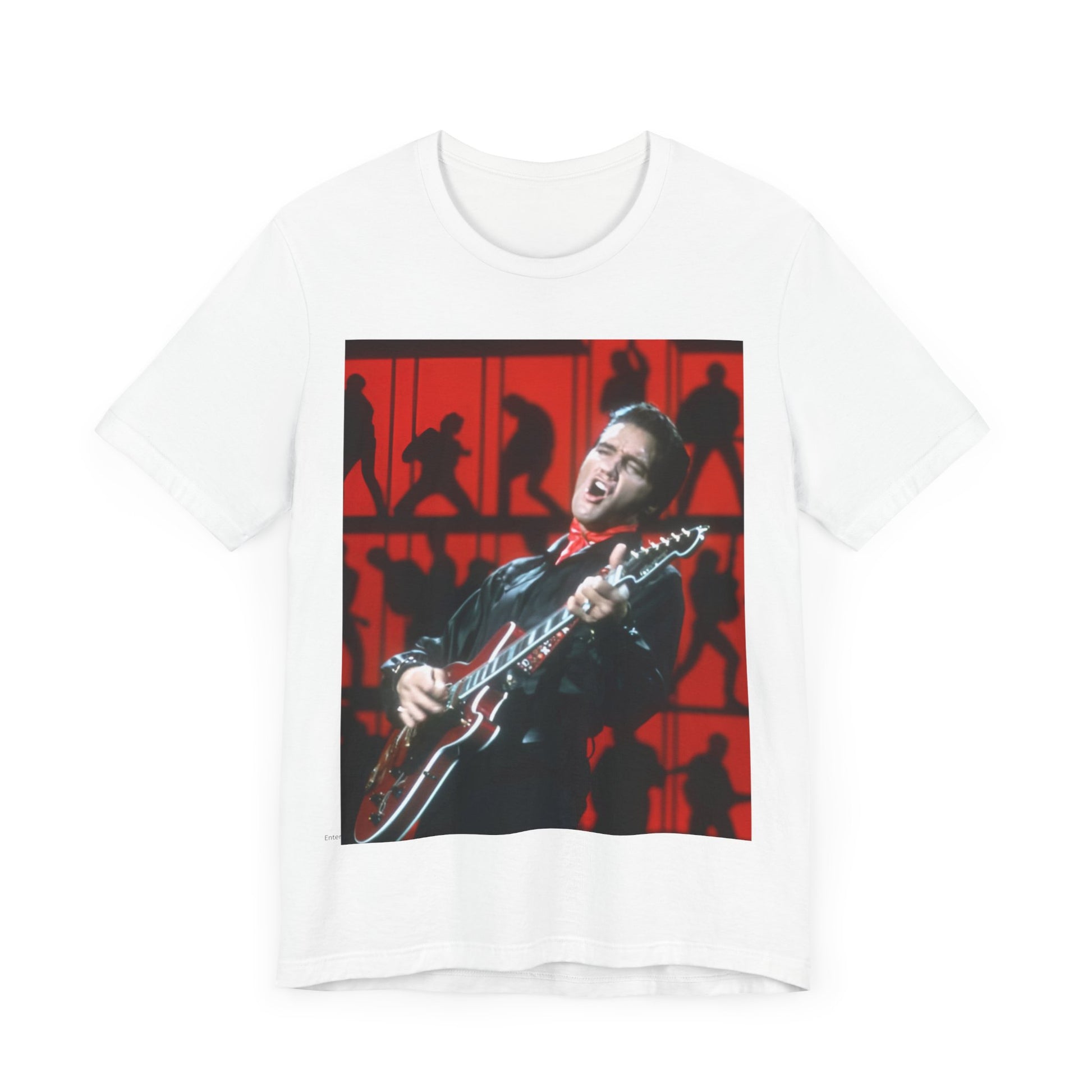A black graphic t-shirt featuring a vintage photo of Elvis Presley from his Las Vegas residency.