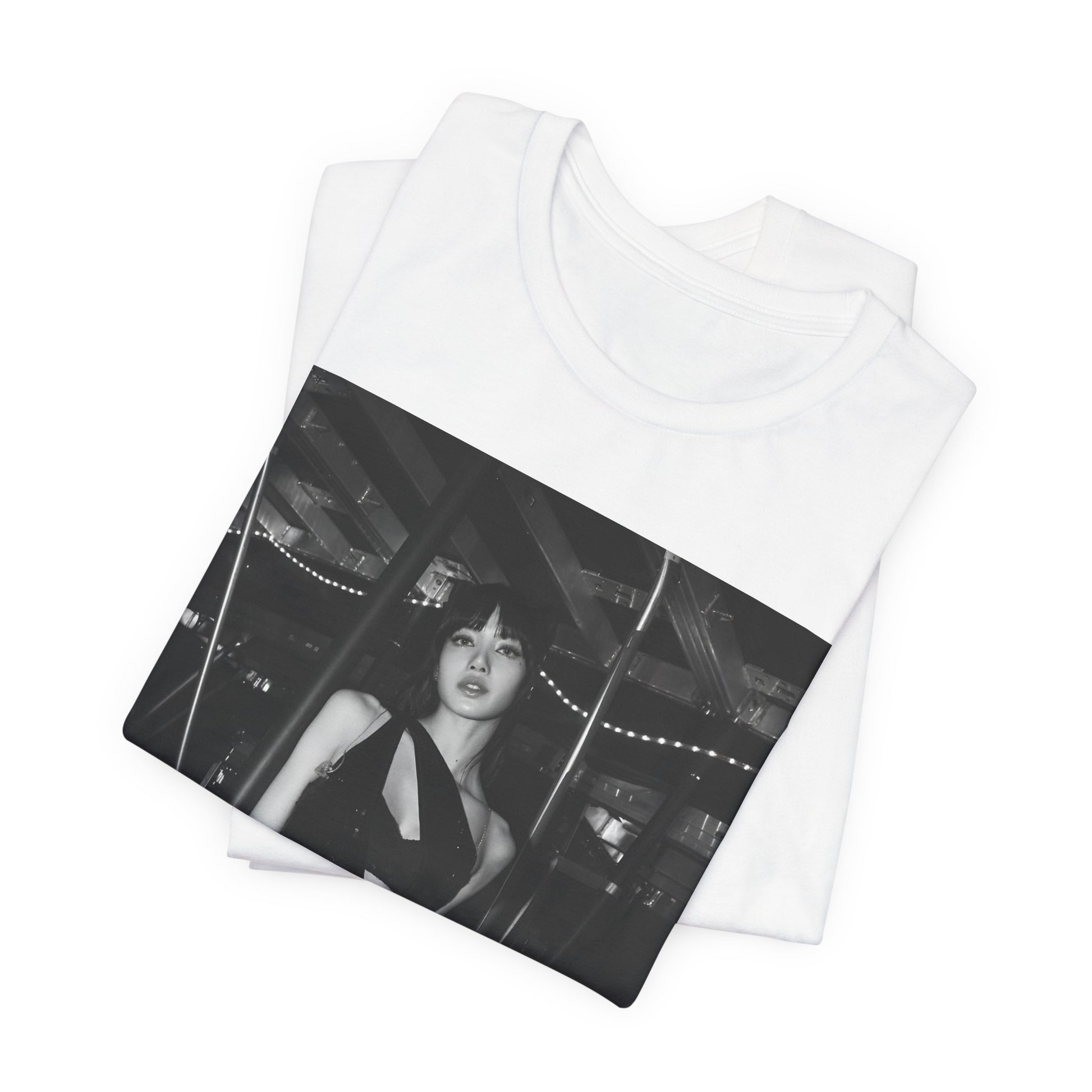 A black graphic t-shirt featuring a black and white graphic or photo of Lisa in a backstage setting.