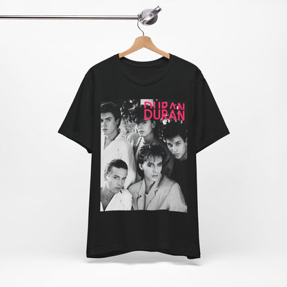 A black graphic t-shirt featuring a black and white graphic or photo of Duran Duran, designed with an 80s retro aesthetic.