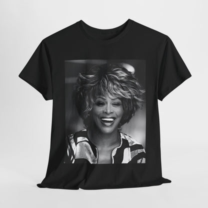 A black graphic t-shirt featuring a classic 80s pop aesthetic graphic of Tina Turner.