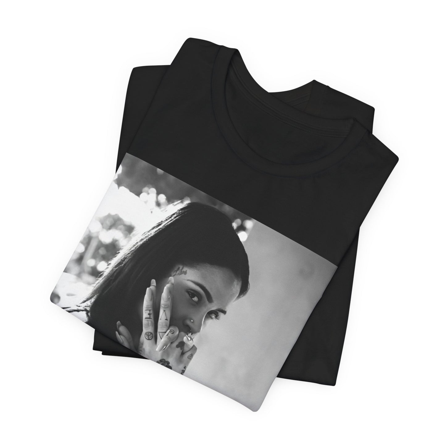 A black graphic t-shirt featuring a graphic related to Kehlani's 'SweetSexySavage' album era.