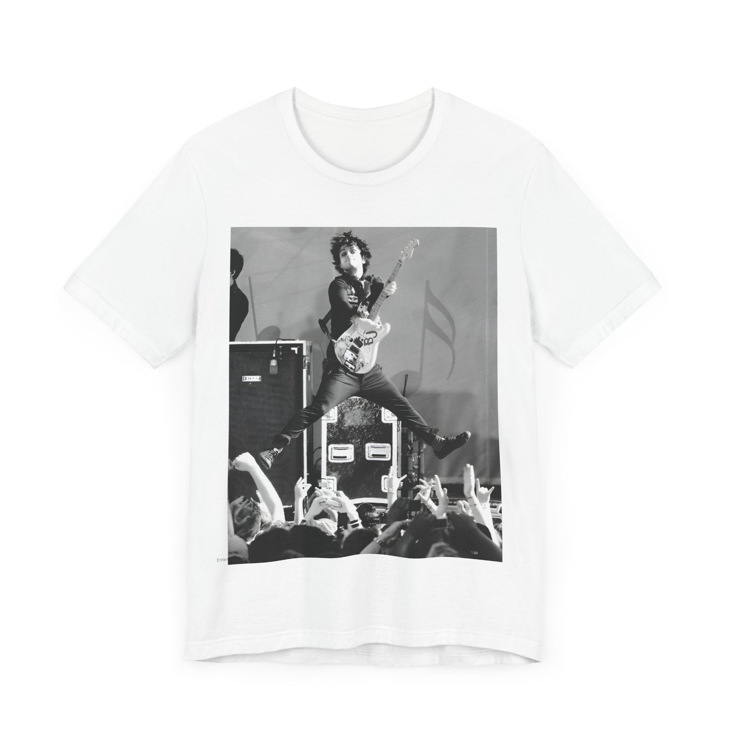 A black graphic t-shirt featuring a graphic of Billie Joe Armstrong from Green Day jumping on stage during a performance.