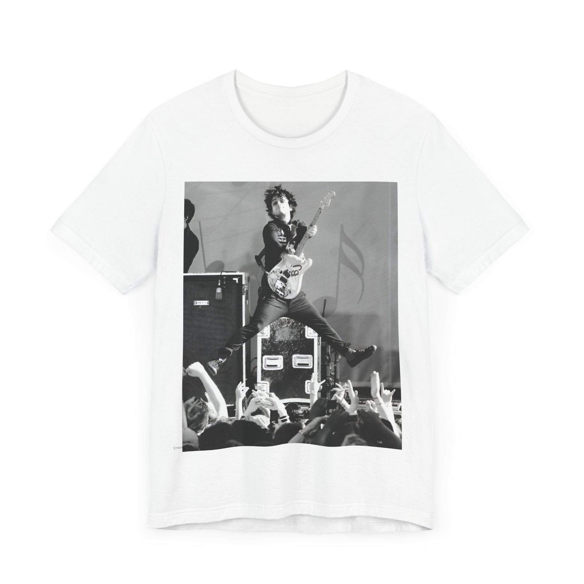A black graphic t-shirt featuring a graphic of Billie Joe Armstrong from Green Day jumping on stage during a performance.