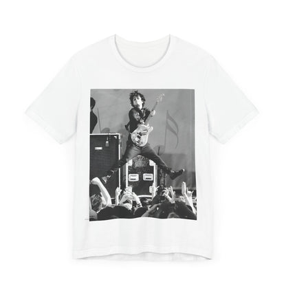 A black graphic t-shirt featuring a graphic of Billie Joe Armstrong from Green Day jumping on stage during a performance.