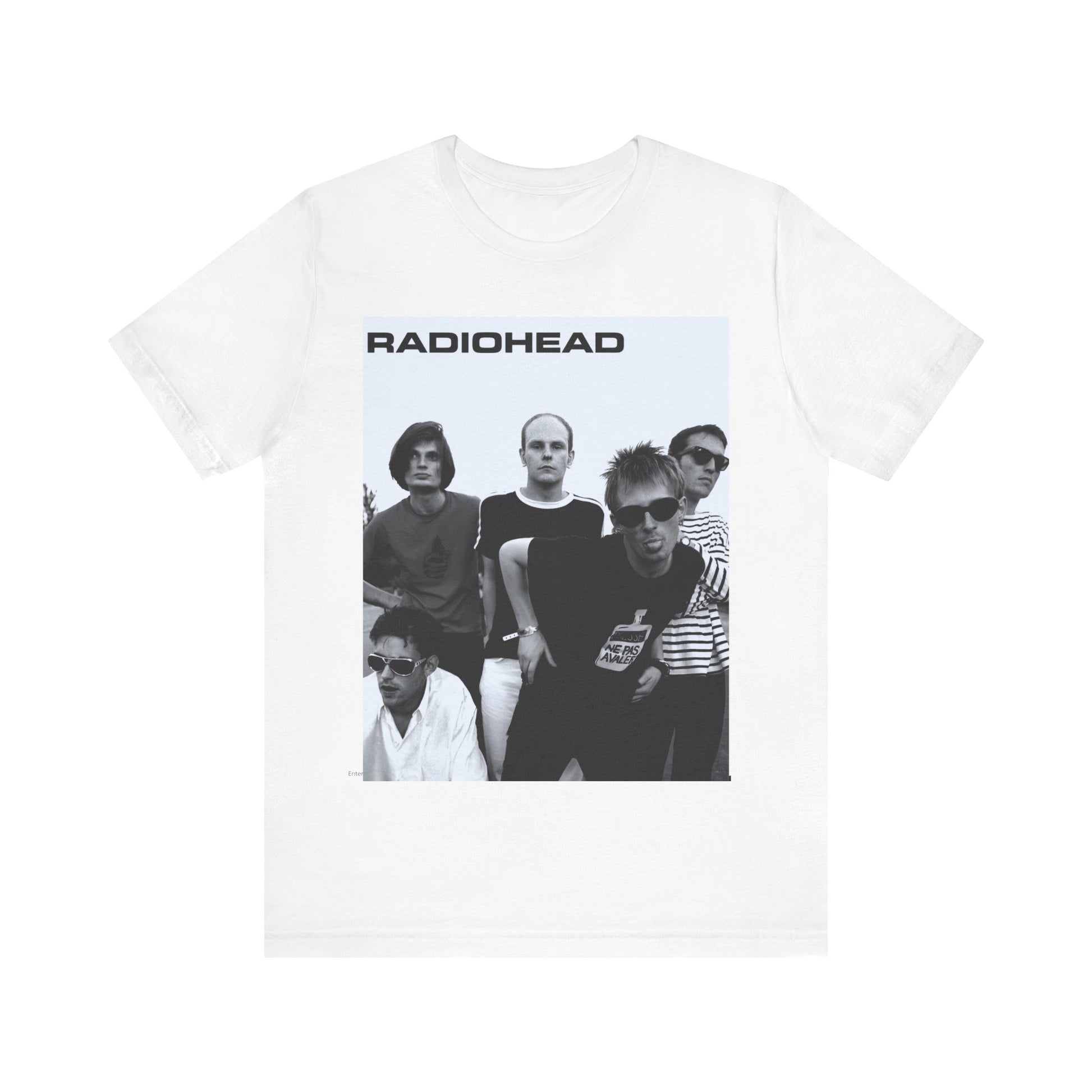 A black graphic t-shirt featuring a vintage 90s graphic related to Radiohead's 'Creep' song or era.