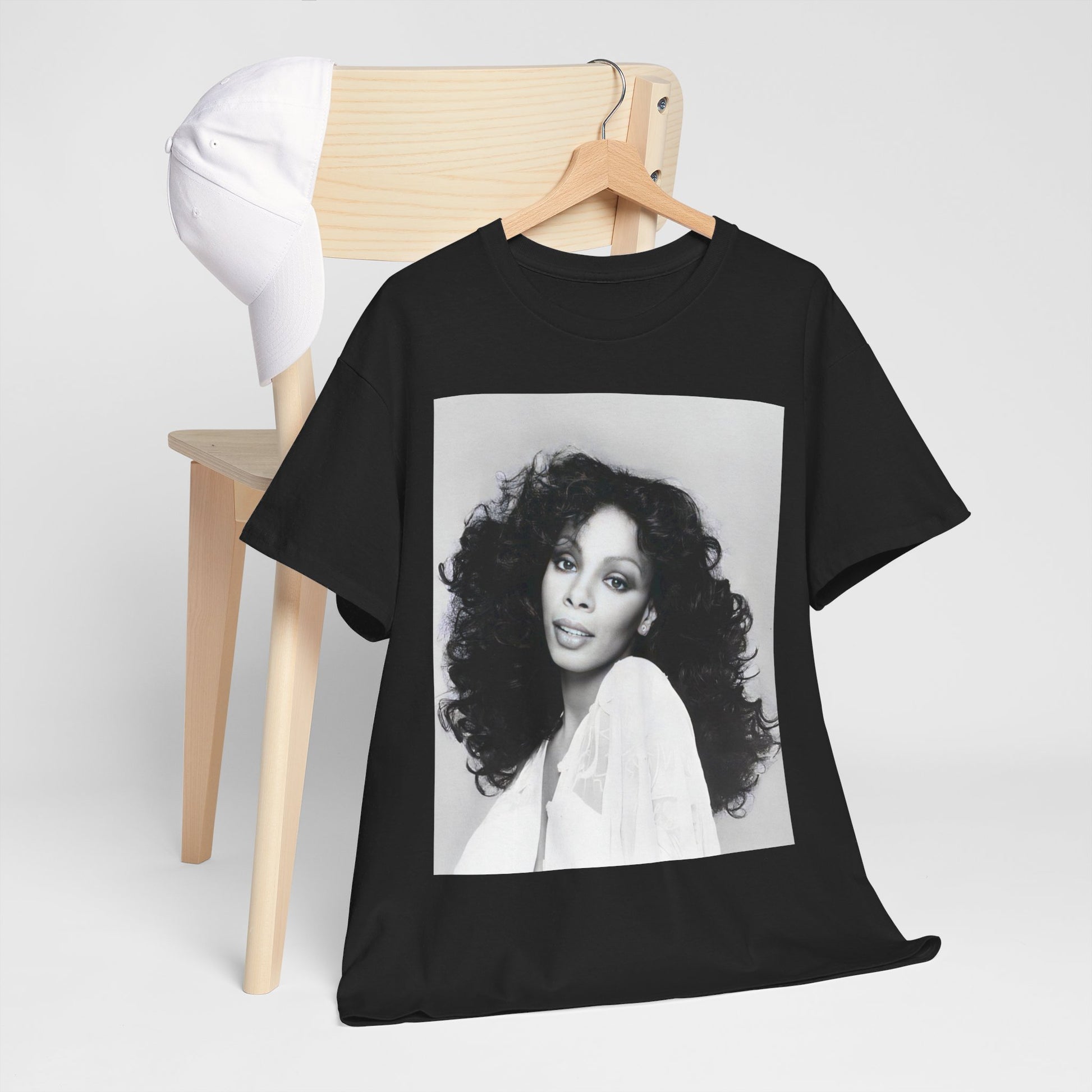 A black graphic t-shirt featuring a black and white portrait photo of Donna Summer.