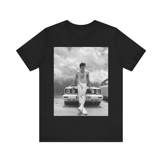 A black graphic t-shirt featuring a graphic of Shawn Mendes in an iconic tank top look.