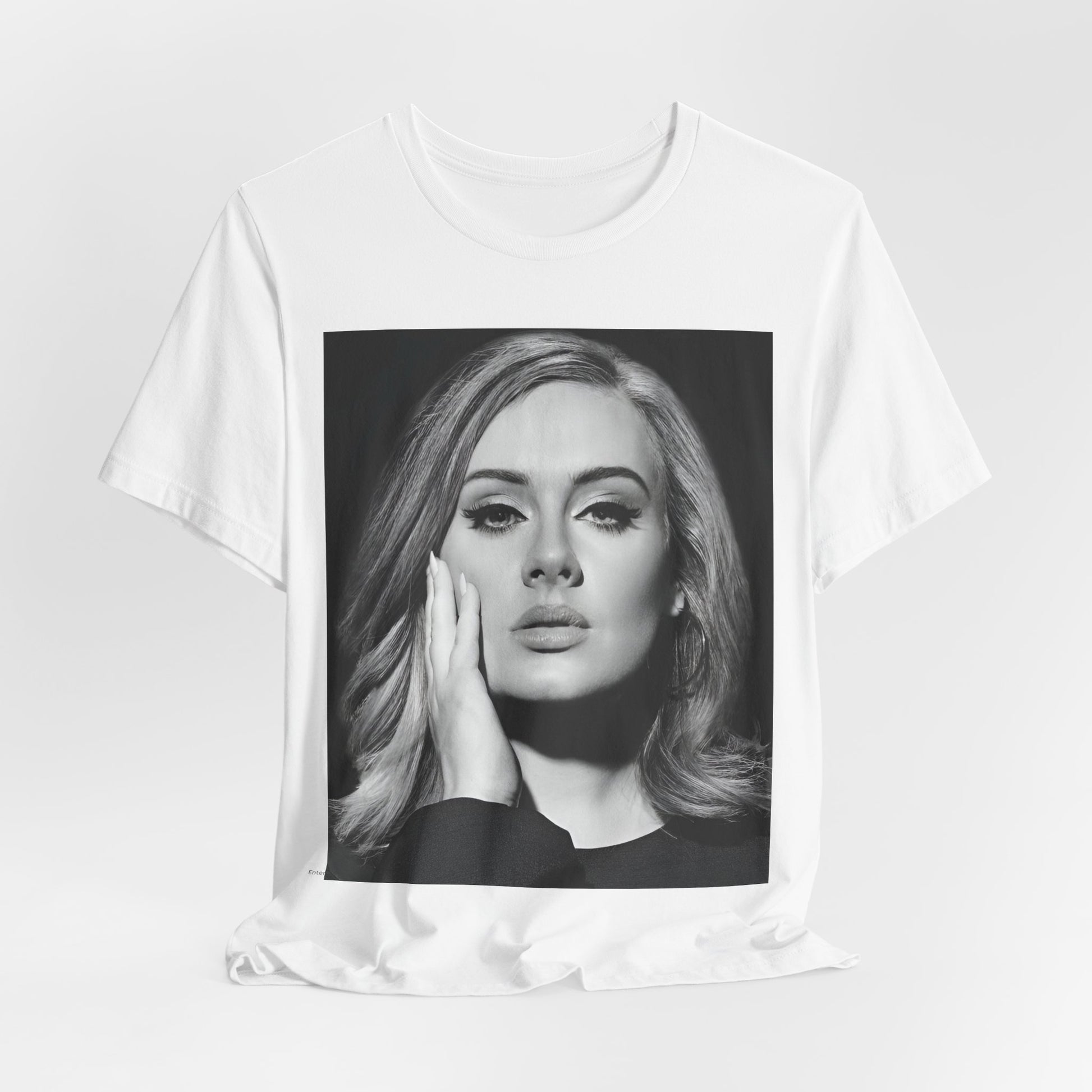 A black graphic t-shirt featuring a studio portrait of Adele from her '25' album era, showing a poised and thoughtful expression with her hair styled elegantly.
