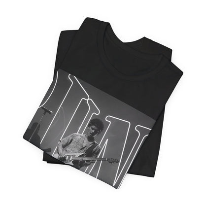 A black graphic t-shirt featuring a black and white photo of Bruno Mars performing live on stage.